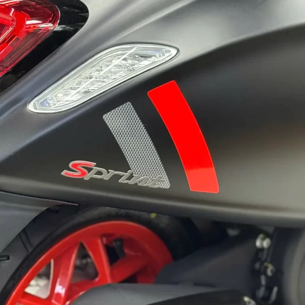 tem than xe vespa sport x kit 2